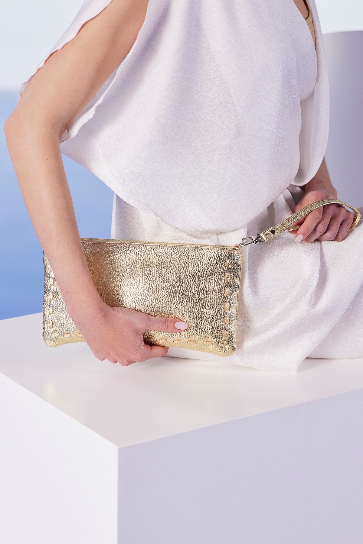 leather clutch bag gold