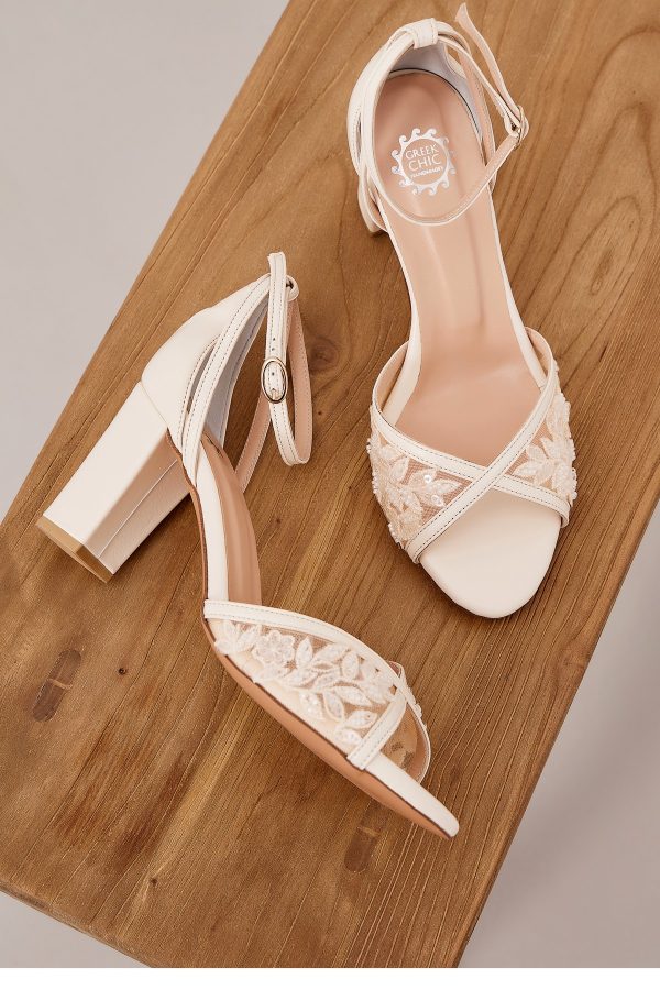 Ivory lace bridal sandals with ankle strap and embroidery